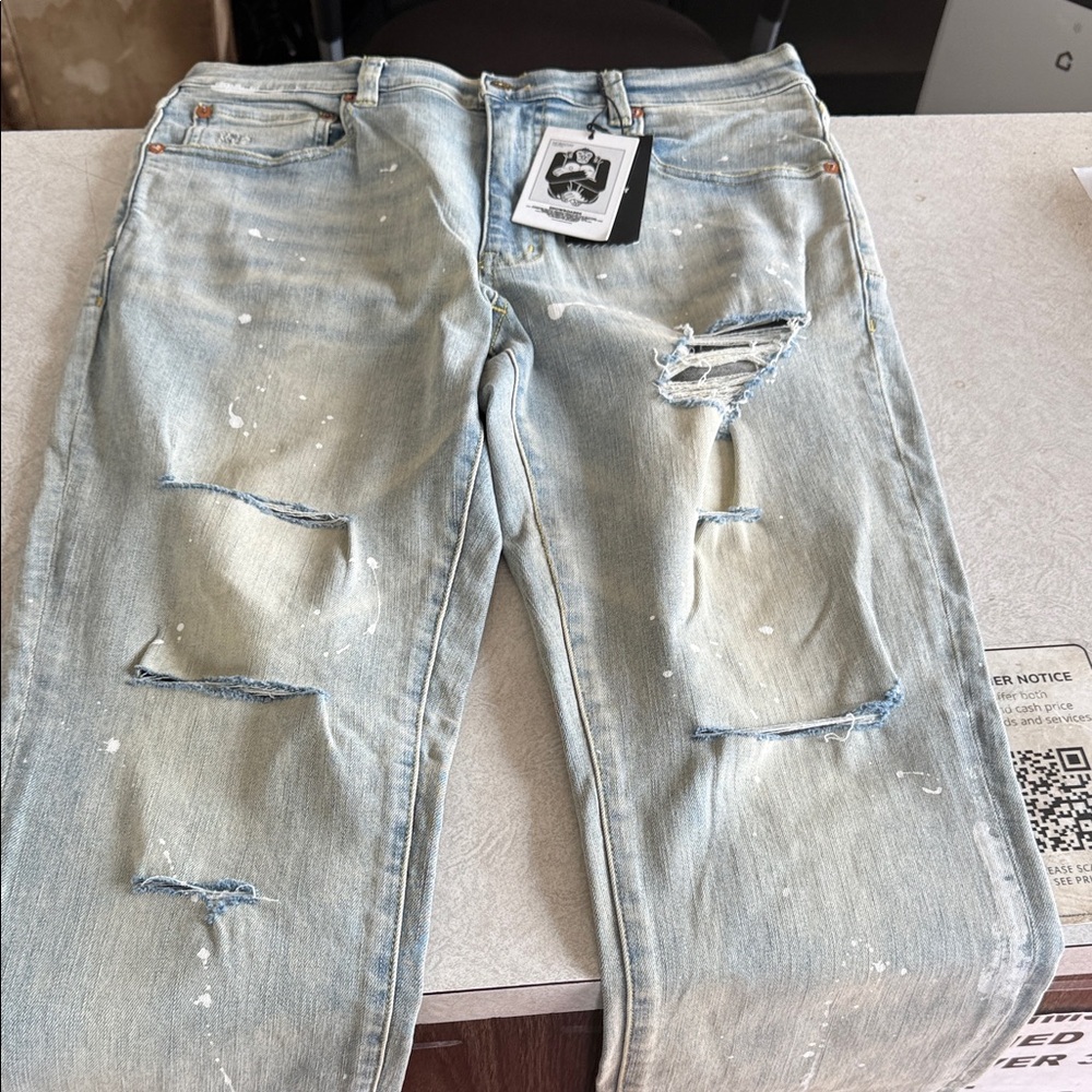 Men's Relaxed Fit Distressed Jeans in Light Blue